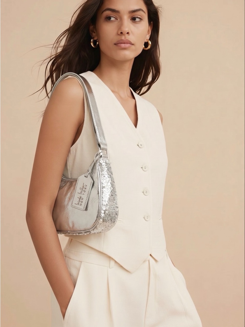 Brand new Nicole Miller NY Silver sequined Crossbody purse. Open pocket inside